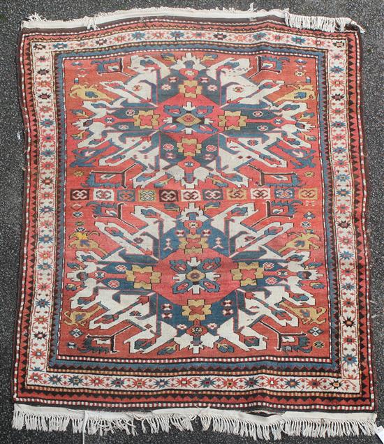 A Kazak rug, 6ft by 4ft 10in.